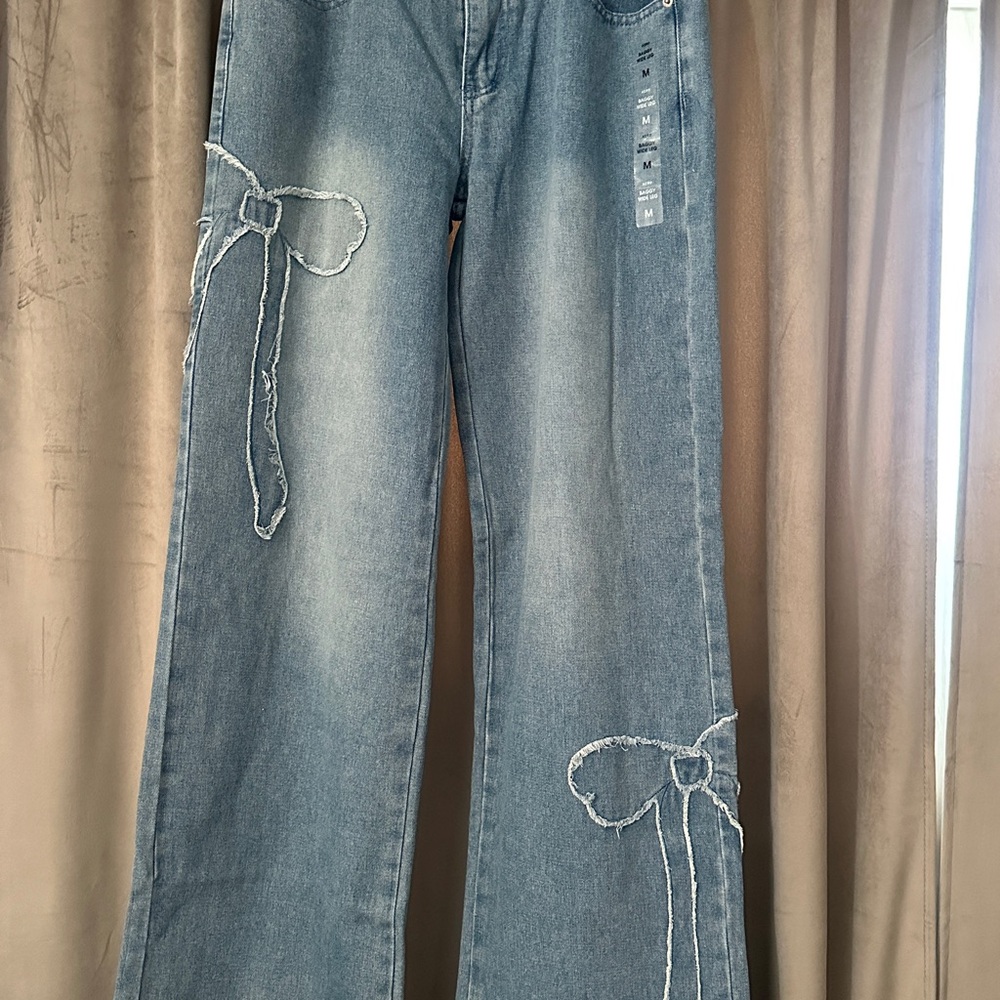 Aeropostale Women's Light Blue Flare Jeans with Bow Accents
